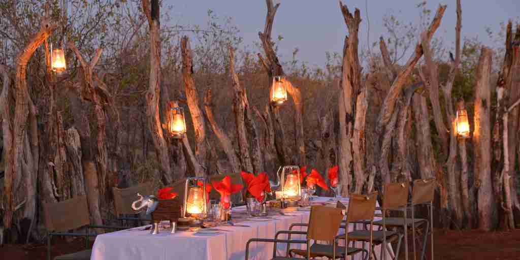 muchenje night dining deck botswana yellow zebra safaris