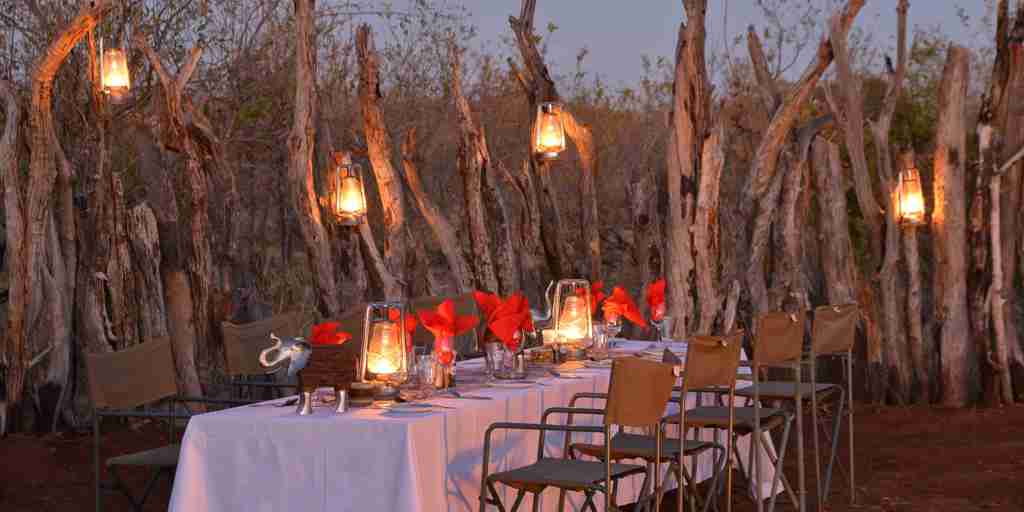 muchenje night dining deck botswana yellow zebra safaris