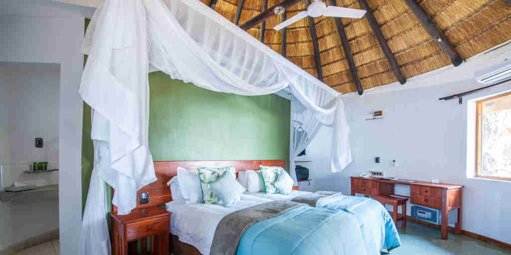 chobe safari lodge bedroom double botswana yellow zebra safaris