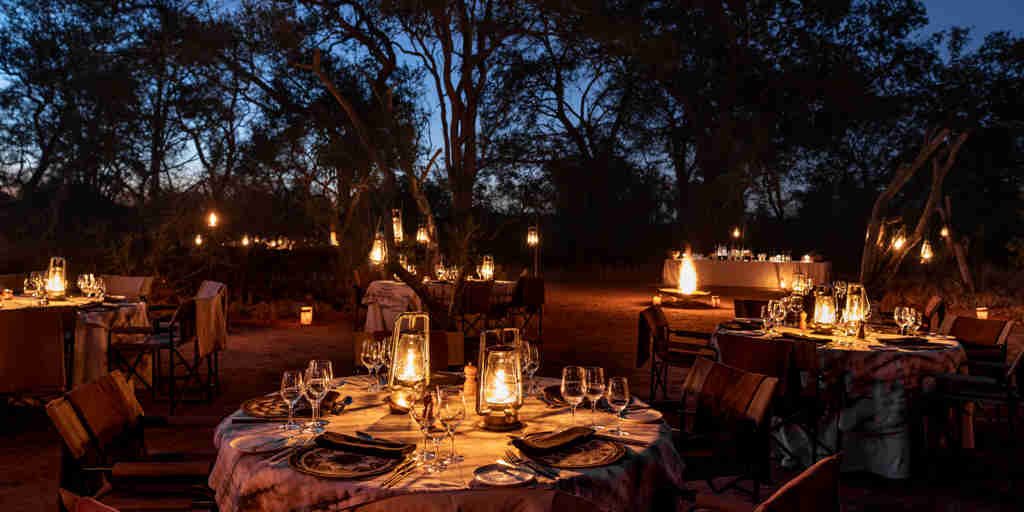 singita ebony lodge night dining south africa yellow zebra safaris
