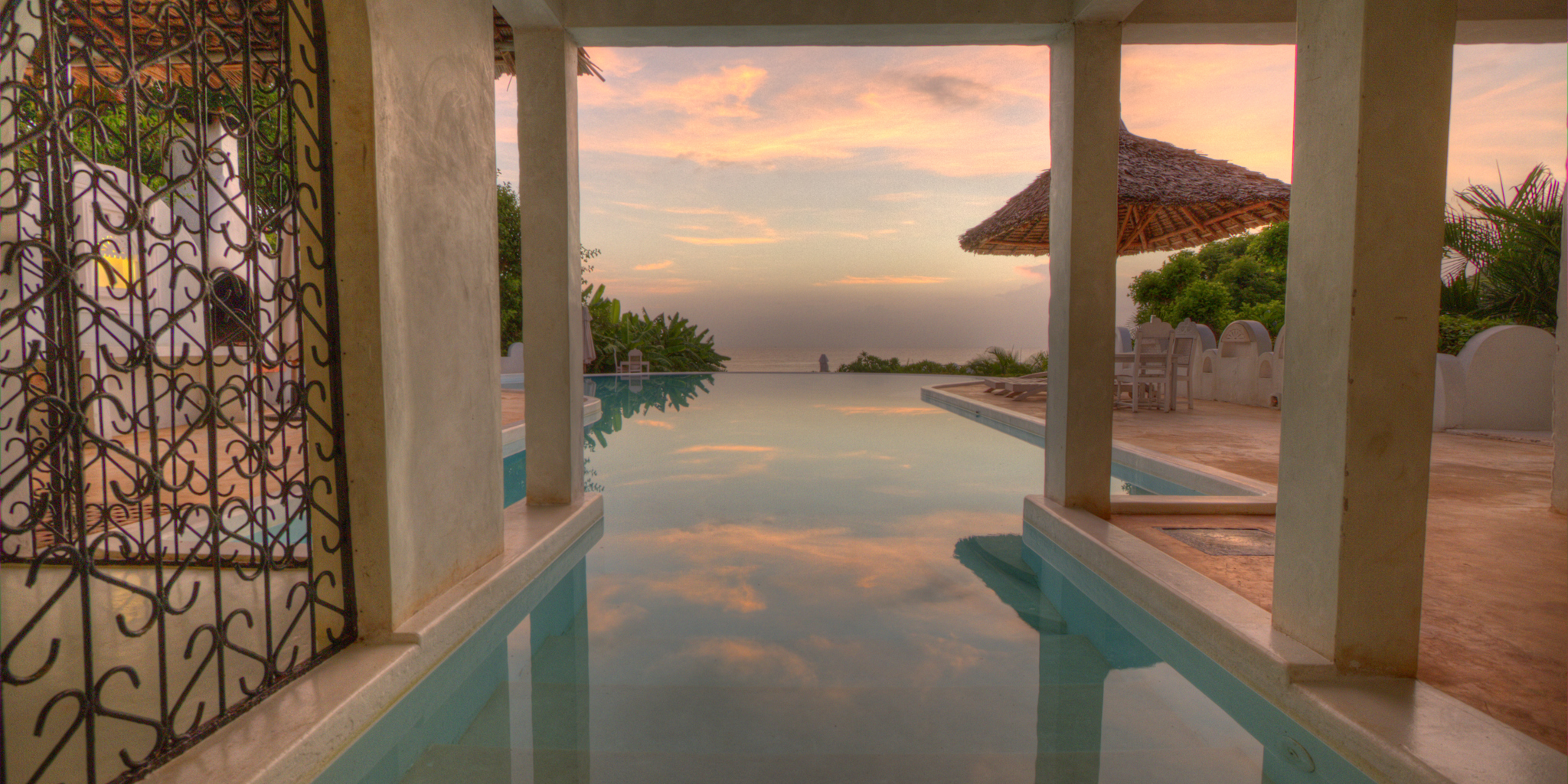 msambweni beach house sunset pool yellow zebra safaris