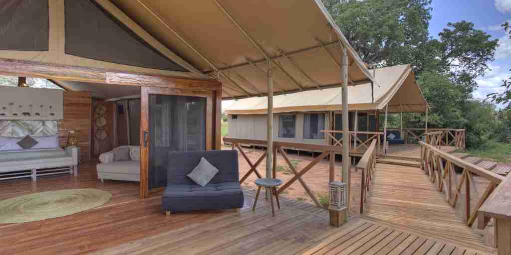 nasikia ndovu tented camp bedroom balcony tanzania yellow zebra safaris