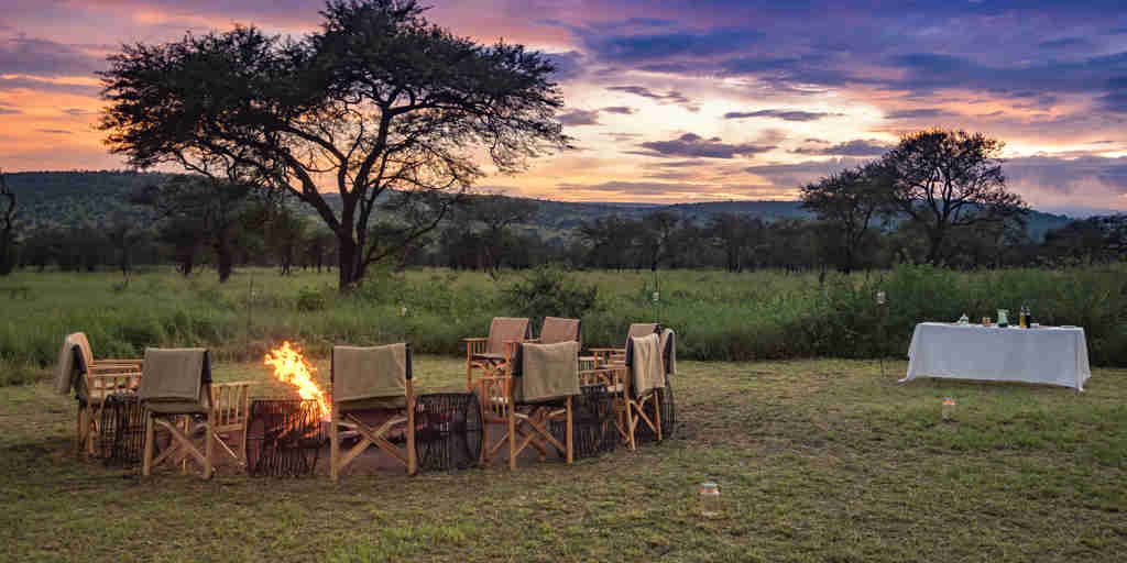 dunia camp sundowners tanzania yellow zebra safaris