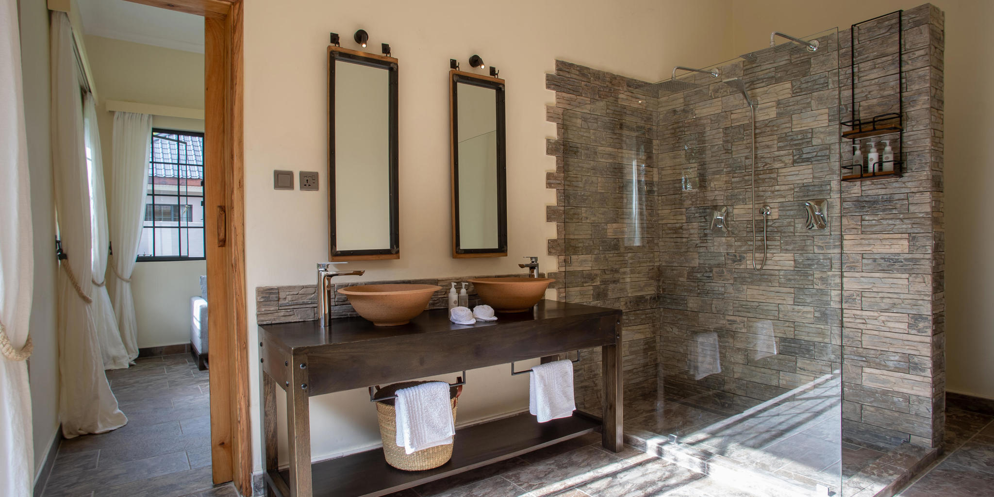 Indoor bathroom Hamerkop House by Lemala, Tanzania