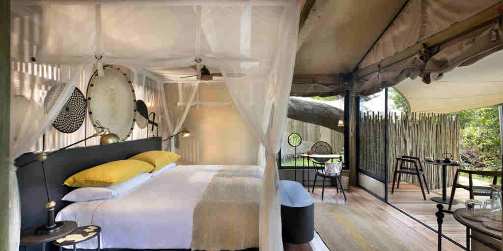 bedroom, Khwai leadwood under thatch, botswana