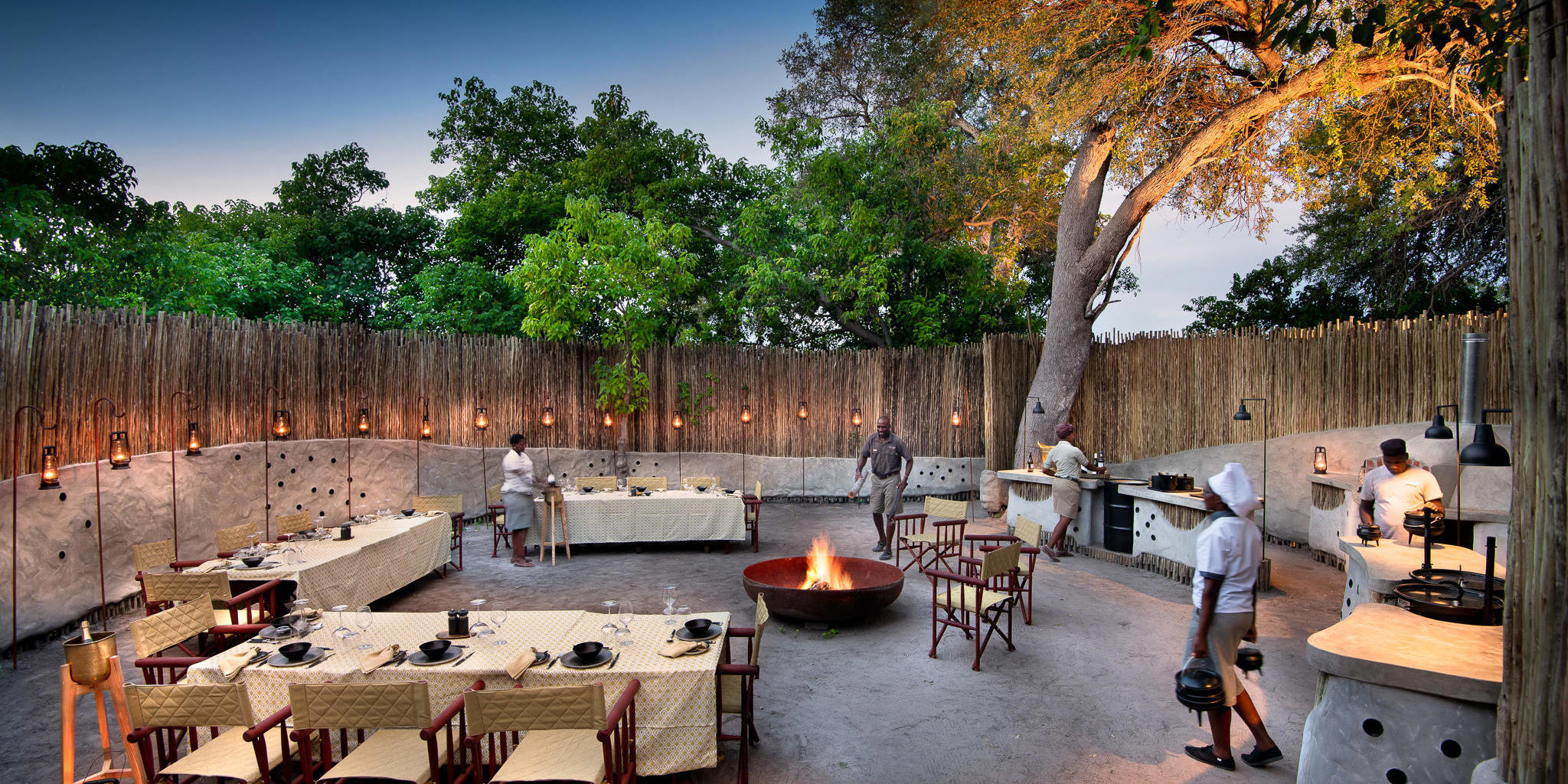 outdoor dining, Khwai leadwood under thatch, botswana