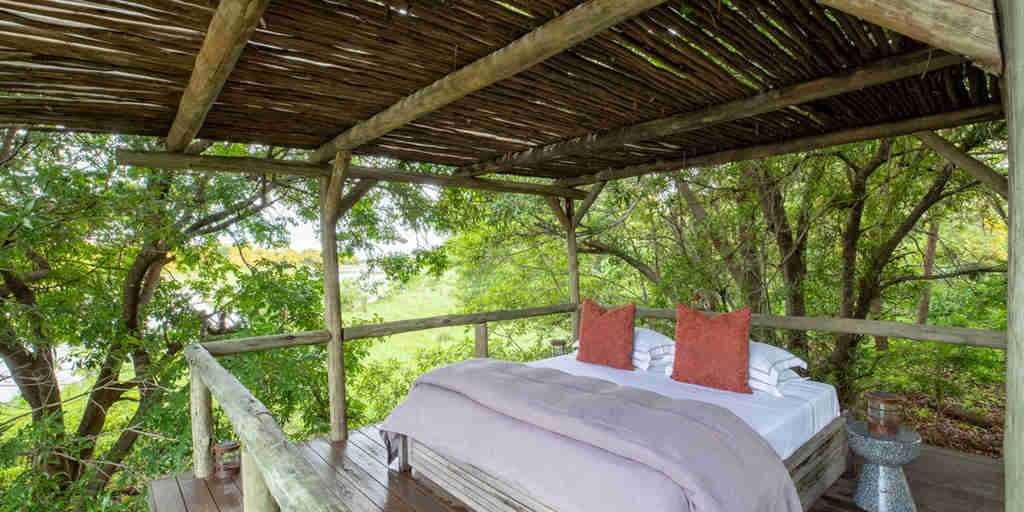 sleepout bed, kapamba bushcamp, south luangwa national park, zambia