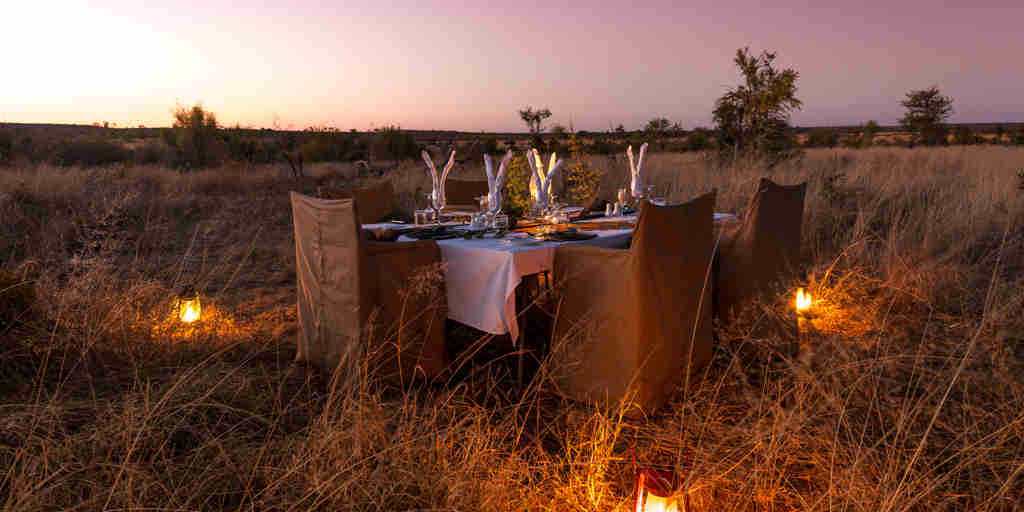 bush dinner, hwange bush camp, hwange national park, zimbabwe