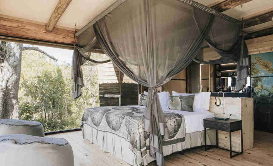 family room bed, vumbura plains, okavango delta, botswana