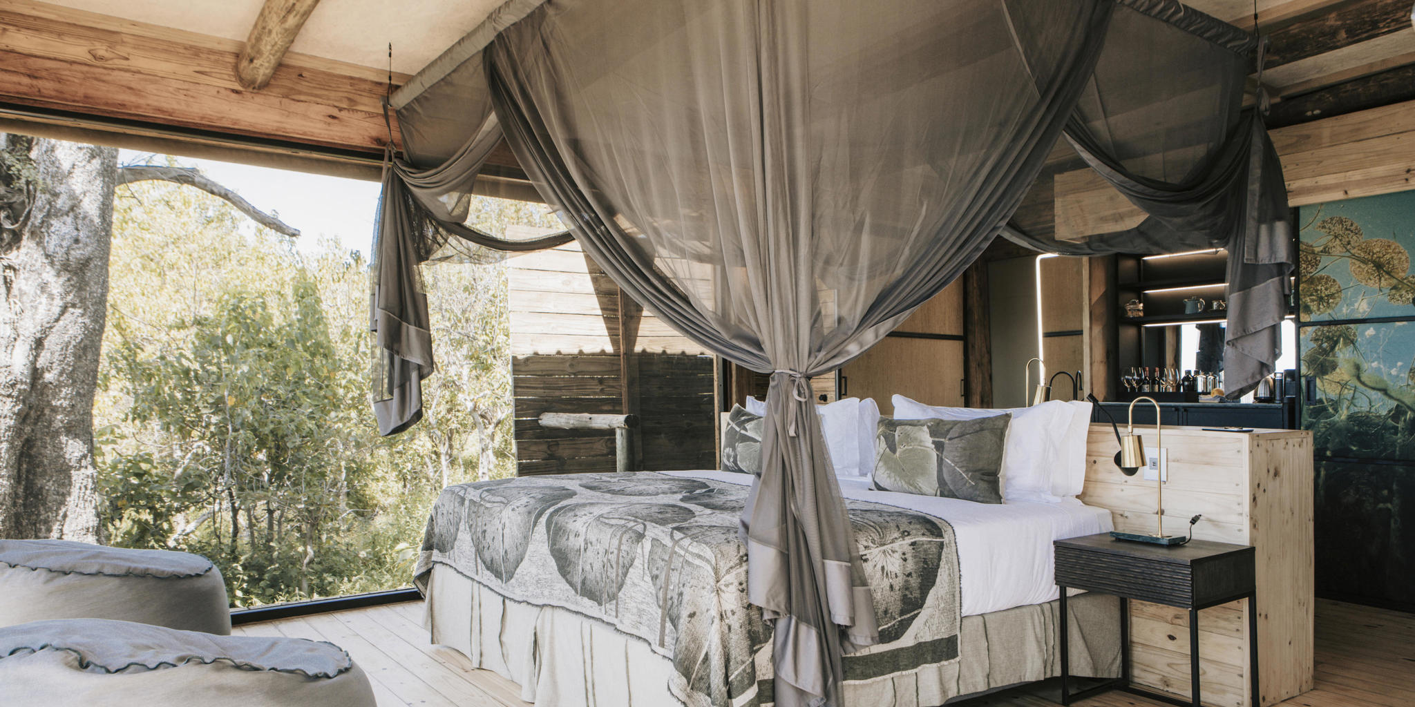 family room bed, vumbura plains, okavango delta, botswana
