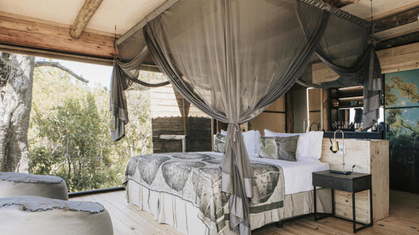 family room bed, vumbura plains, okavango delta, botswana