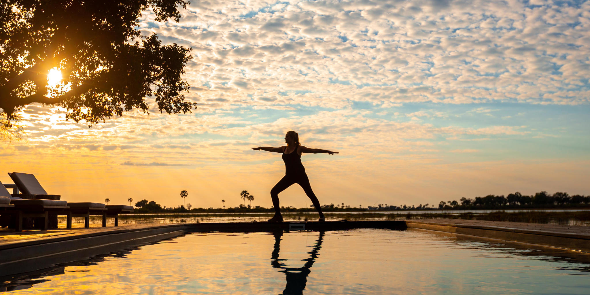 sunset yoga, abu camp, okavango delta, botswana