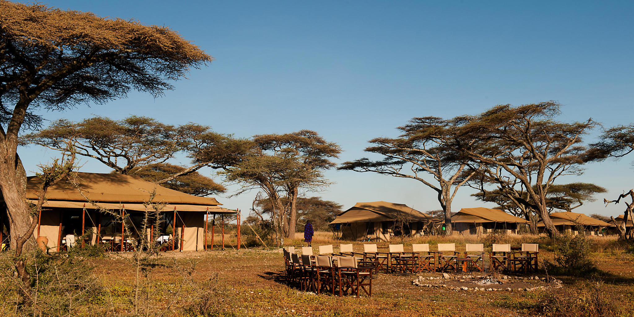 camp fire daytime, mara under canvas tented camp, the serengeti, tanzania