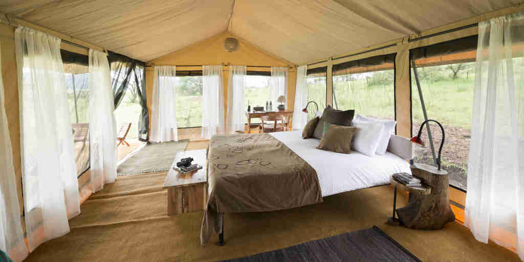 bedroom interior, nyikani camp central serengeti, tanzania