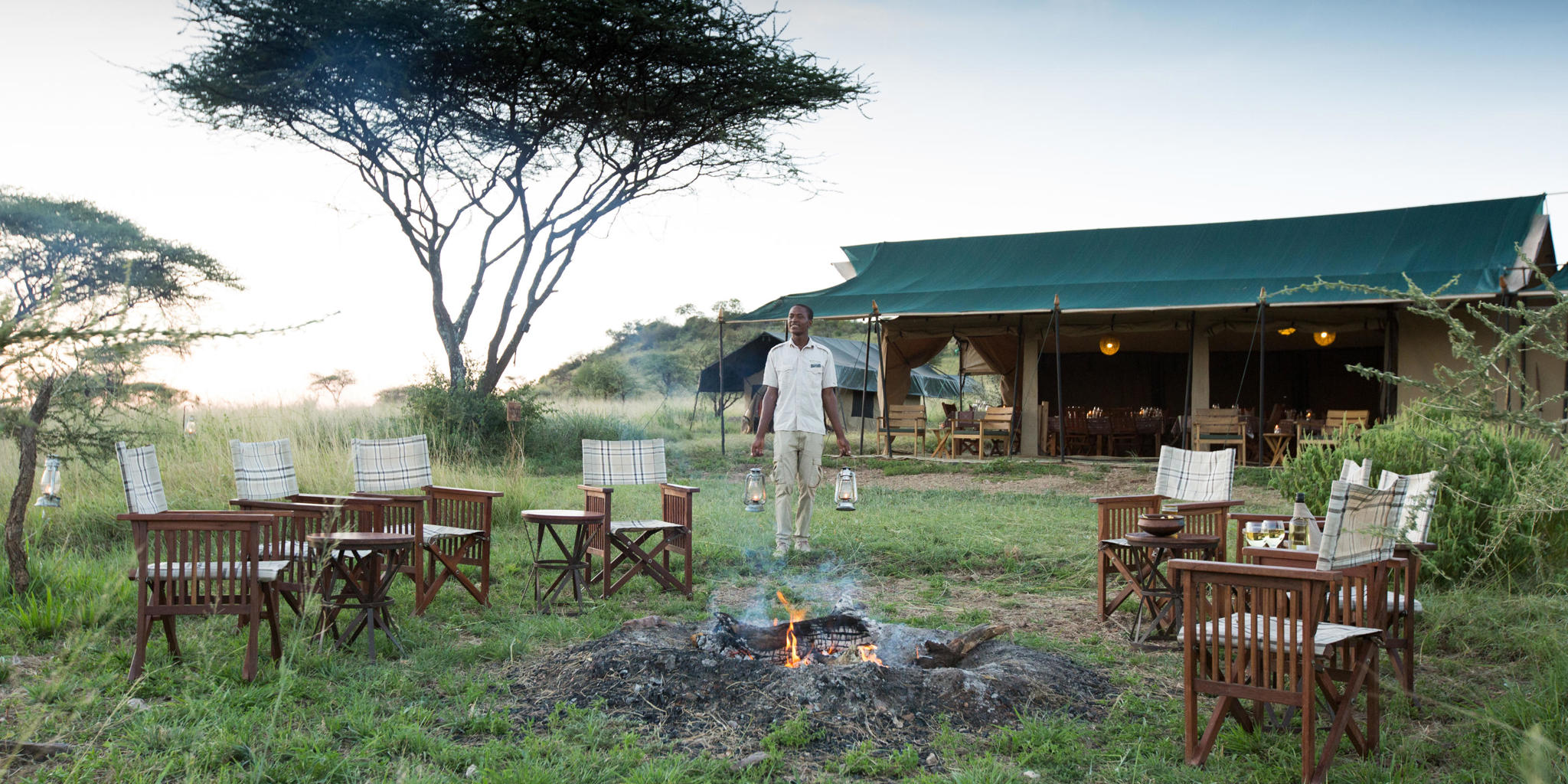 evening camp fire, nyikani camp central serengeti, tanzania