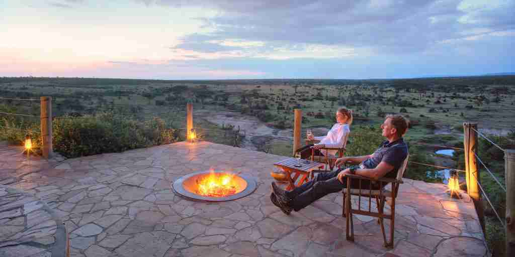 fireplace with a view, basecamp eagle view, greater mara conservancies, kenya