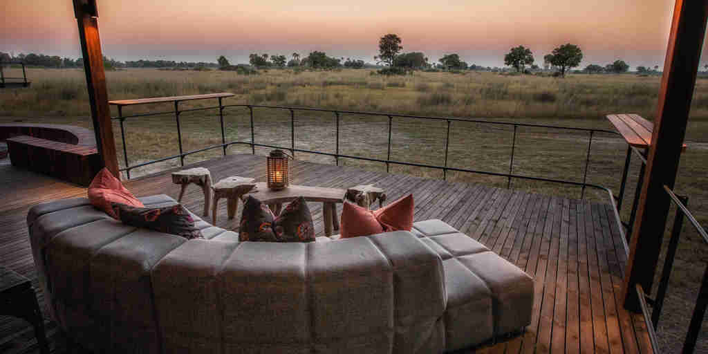lounge area with view, chitabe camp, okavango delta, botswana