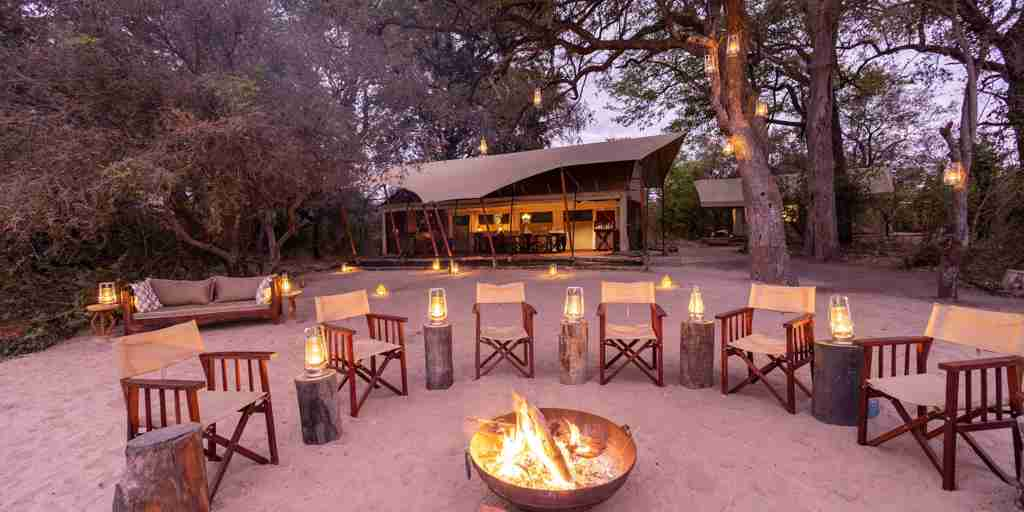 camp fire, okavango explorers camp, selinda game reserve, botswana