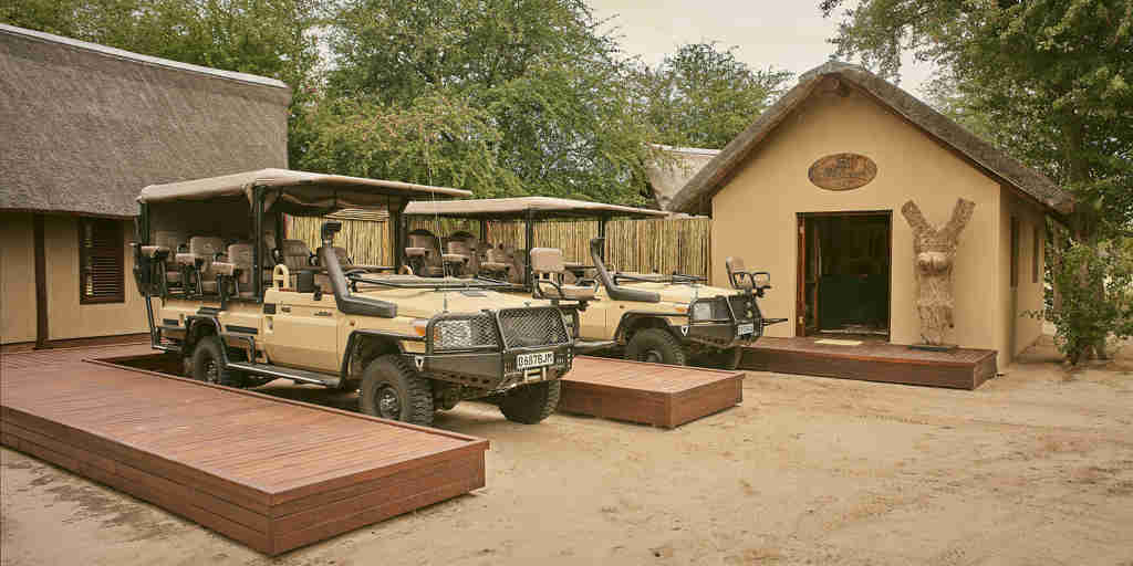 Game safari vehicles, Deception Valley Camp, Botswana