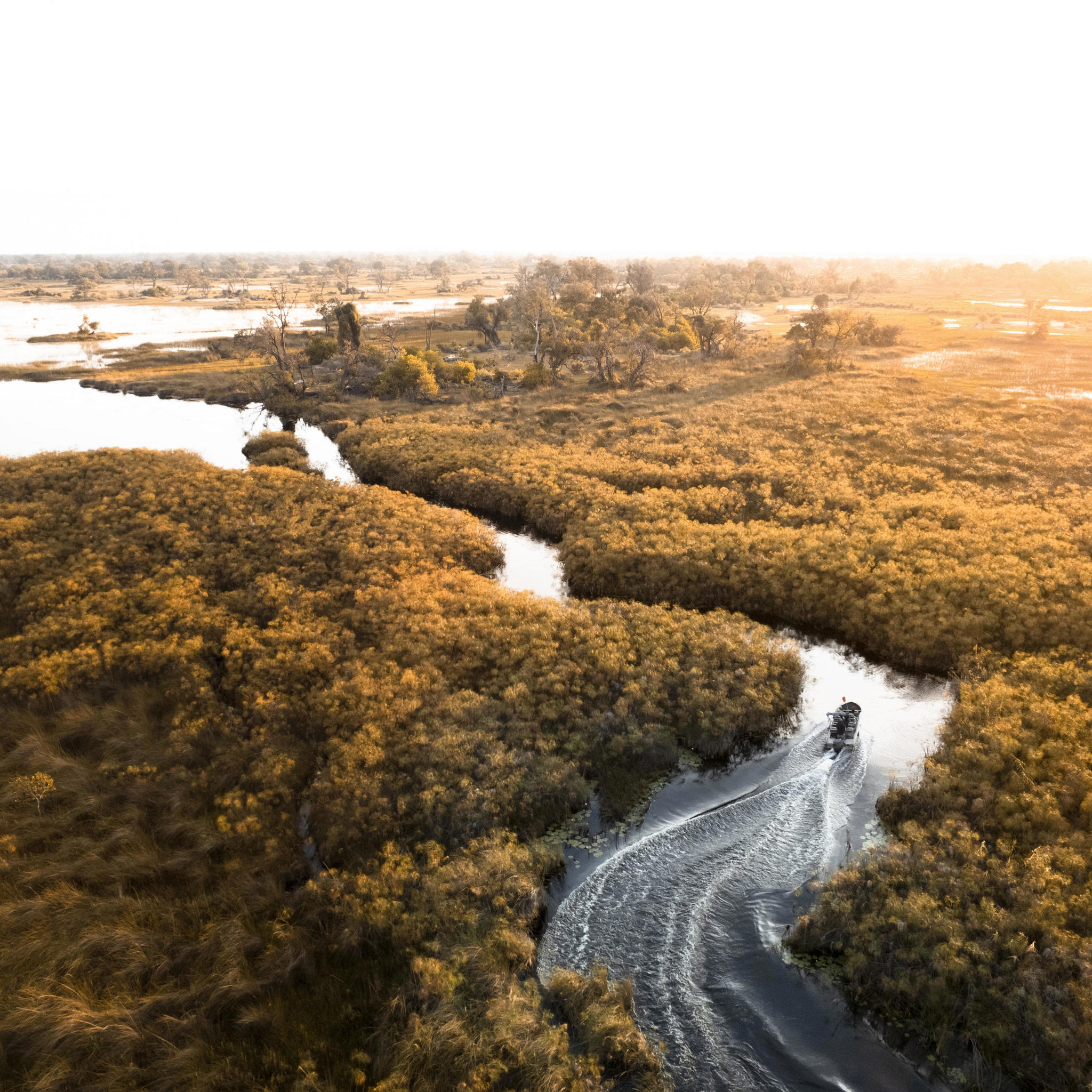 Aerial view, boating activity, Wilderness Vumbura Plains, Botswana