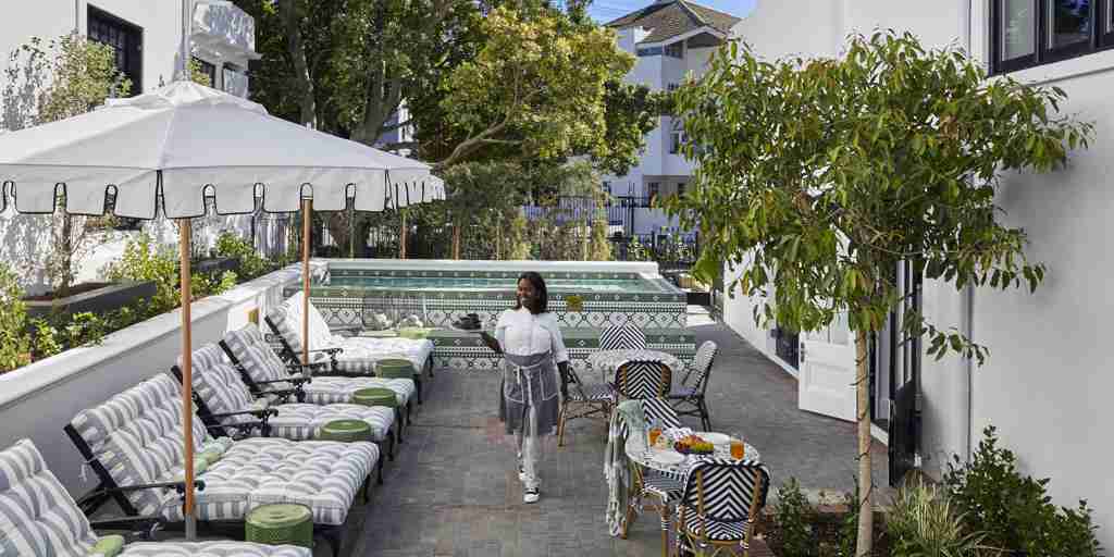 sunbeds and pool, cape cadogan boutique hotel, cape town, south africa