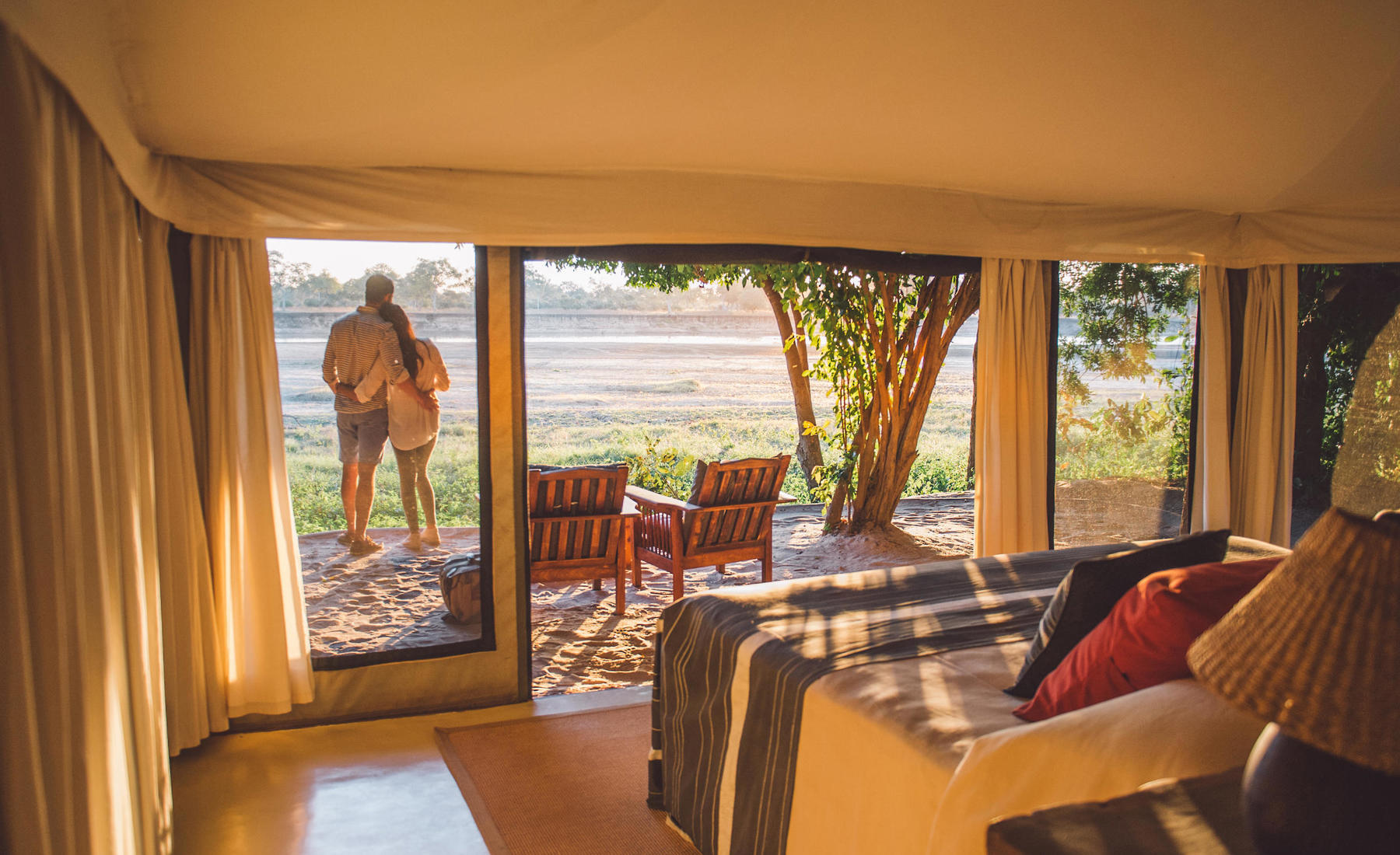 couple in camp, the original south luangwa camps, zambia trips