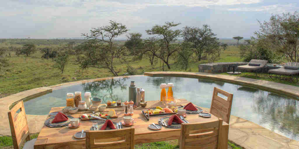 lunch by the pool, naboisho camp, greater mara conservancies, kenya