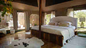 king bed, wayo manyara green camp, tanzania