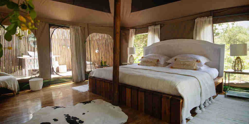 king bed, wayo manyara green camp, tanzania