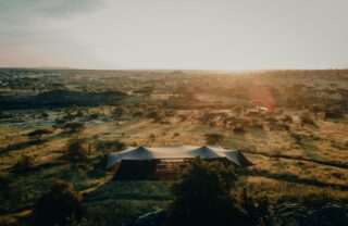 Luxury safari camp in open grassland, Serengeti, Tanzania, Yellow Zebra Safaris