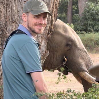 Cal watches an elephant on foot, Mana Pools, Zimbabwe