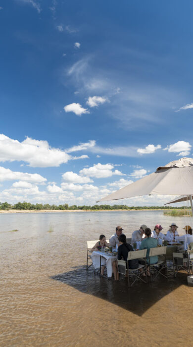 water dining at mana sands, zimbabwe - Yellow Zebra Safaris