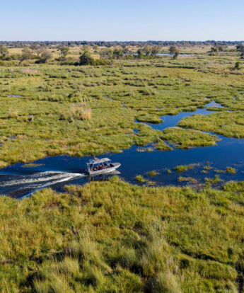 boating on the delta, mbamba, botswana - Yellow Zebra Safaris