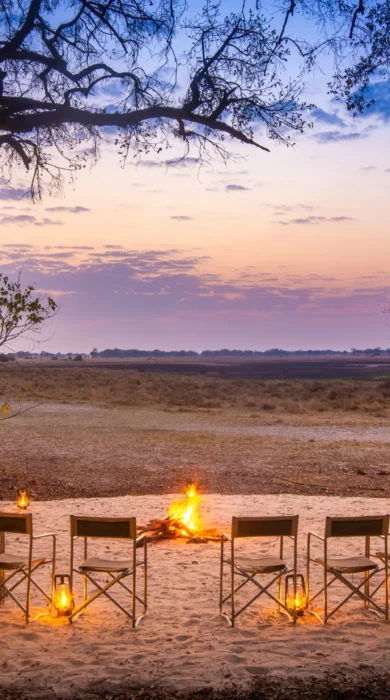 kwara camp fire seating botswana yellow zebra safaris