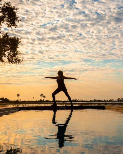 sunset yoga, abu camp, okavango delta, botswana