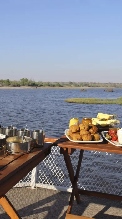 &Beyond Chobe Under Canvas boating food alcohol