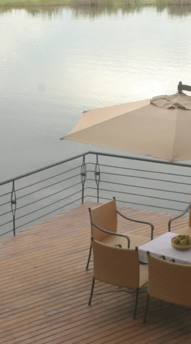 chobe safari lodge balcony dining botswana yellow zebra safaris