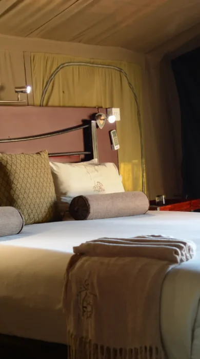 camp savuti double bed botswana yellow zebra safaris