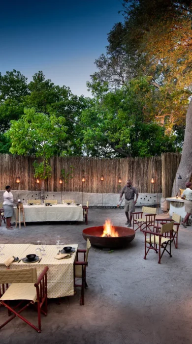 outdoor dining, Khwai leadwood under thatch, botswana