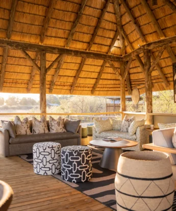lounge with sofa's 4 rivers, okavango delta, botswana