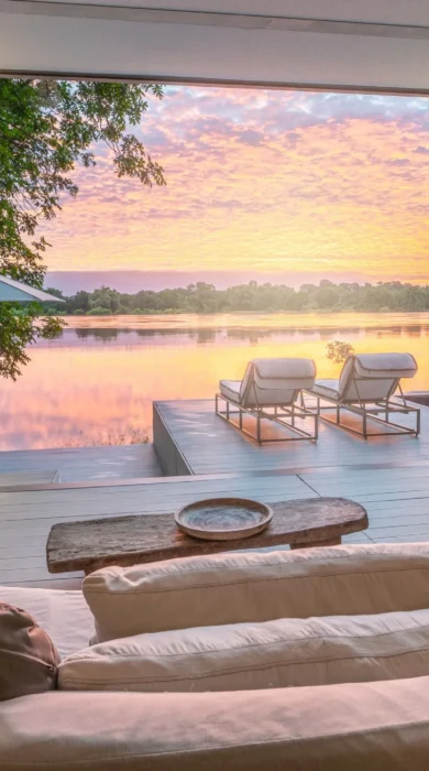 sunset lounge view, time and tide chinzombo, south luangwa national park, zambia