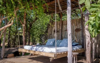 changa safari camp swing bed zimbabwe yellow zebra safaris