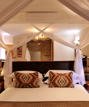 Victoria Falls Safari Club bedorom
