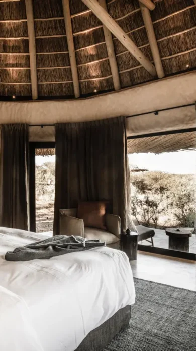 omaanda windhoek namibia bedroom view yellow zebra safaris