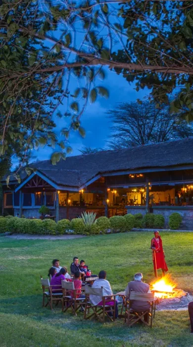 Tipilikwani Mara Camp fire kenya yellow zebra safaris