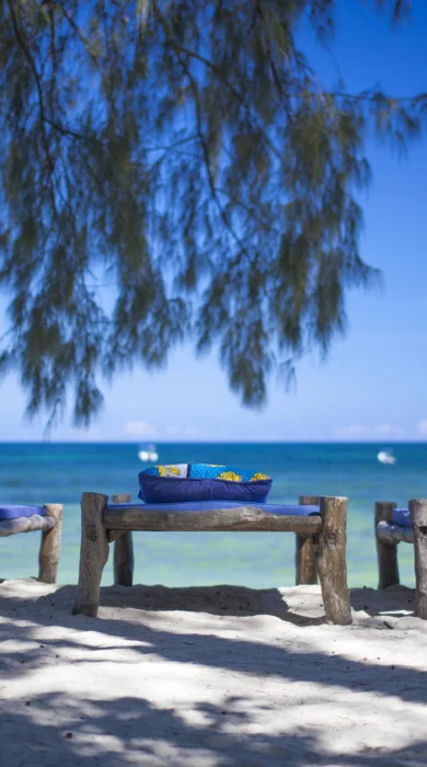 deck chairs on diani beach, kenya safaris