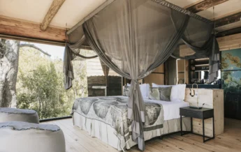 family room bed, vumbura plains, okavango delta, botswana