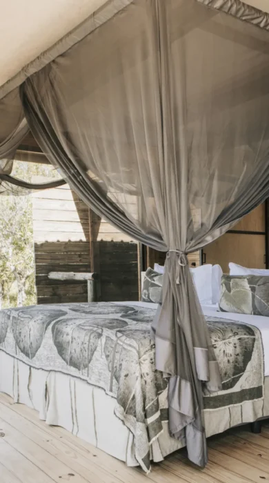 family room bed, vumbura plains, okavango delta, botswana