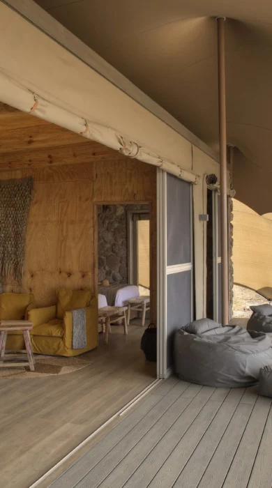 family tent room deck namiri plains tanzania yellow zebra safaris