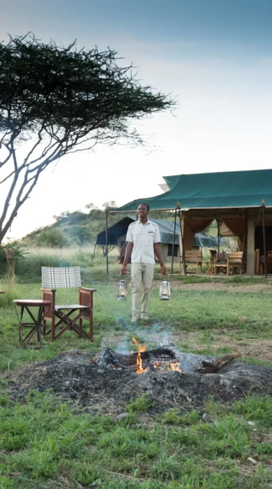 evening camp fire, nyikani camp central serengeti, tanzania